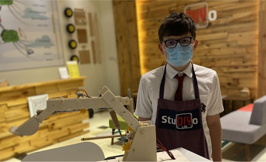 Student with Tank Project